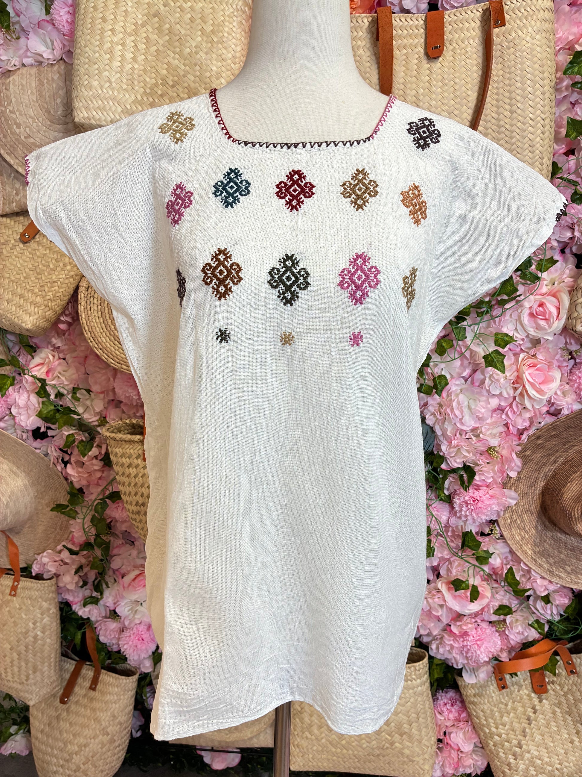 Vista trasera blusa artesanal blanca talla S