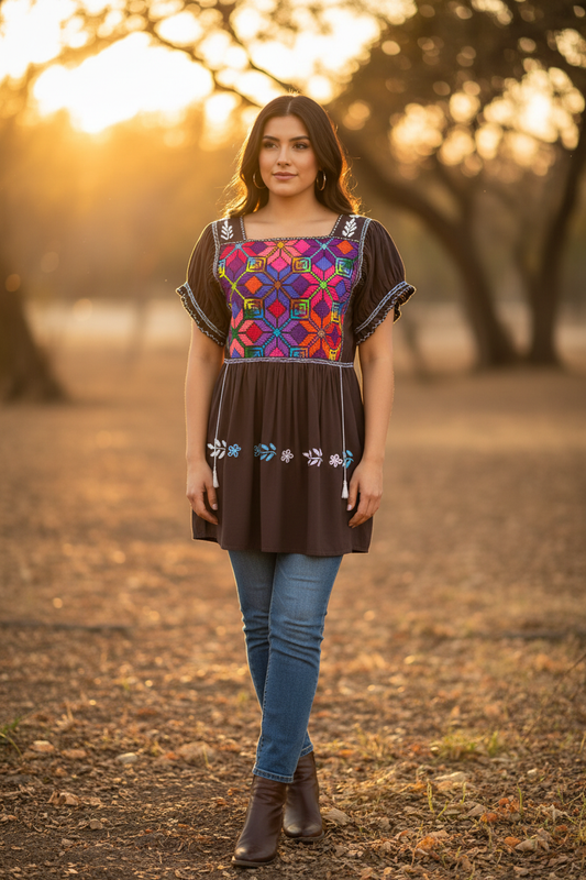 Blusón café chocolate punto de cruz con jeans y botas - fotografía editorial