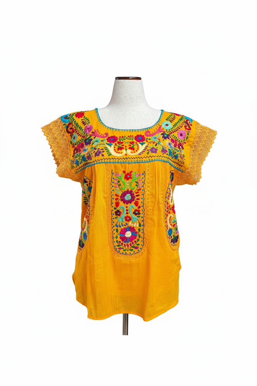 Blusa amarilla bordada con fondo blanco