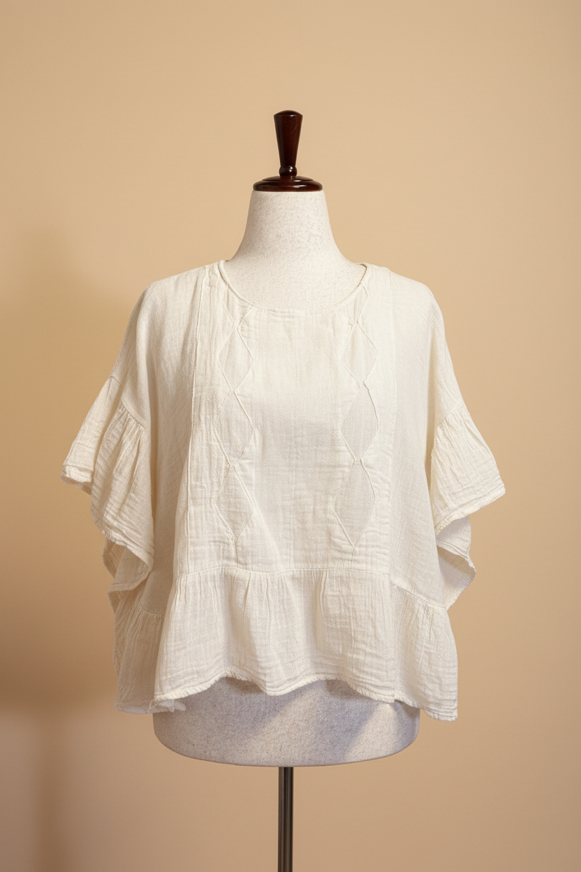 Blusa blanca frente fondo beige