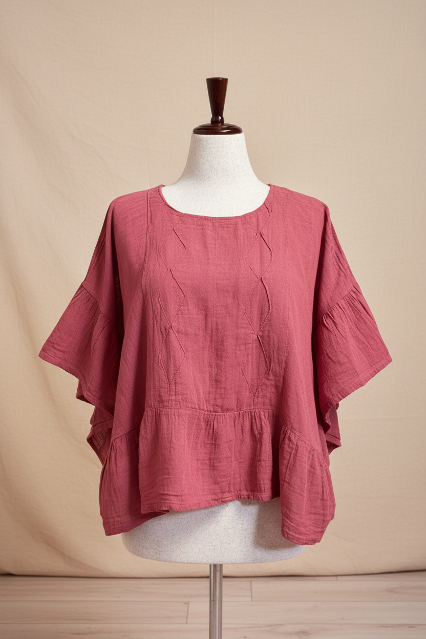 Blusa rosa frente fondo beige